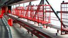 Conveyor systems for roll containers